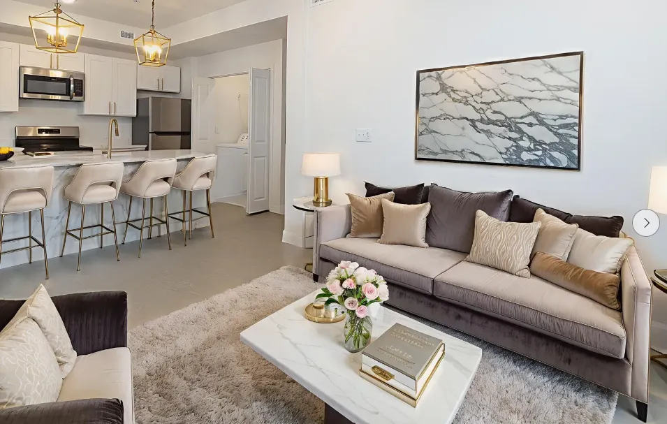 Luxury living room with a sectional sofa and kitchen island seating
